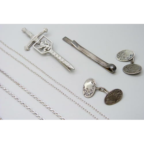 7051 - A collection of silver jewellery including a stone set pendant, chains and cufflinks, 52g, together ... 