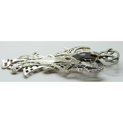 7051I - An Art Deco silver and marcasite pendant in the style of Henri Vever, 43g, 10.3cm