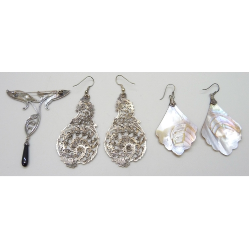 7051N - A silver Art Nouveau style brooch, 7cm drop, a  pair of silver mounted shell earrings, and a pair of... 