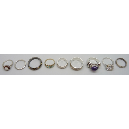 7053 - Eight silver rings, 41g, and a plated ring