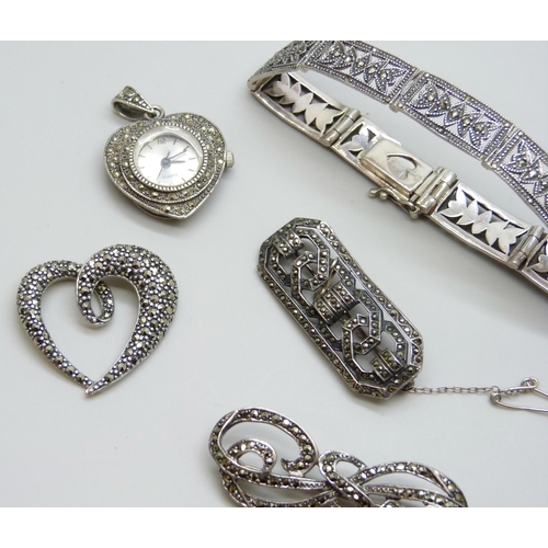 7058 - A collection of silver and marcasite jewellery - a bracelet, two brooches and a pendant, 41g, togeth... 