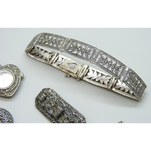 7058 - A collection of silver and marcasite jewellery - a bracelet, two brooches and a pendant, 41g, togeth... 