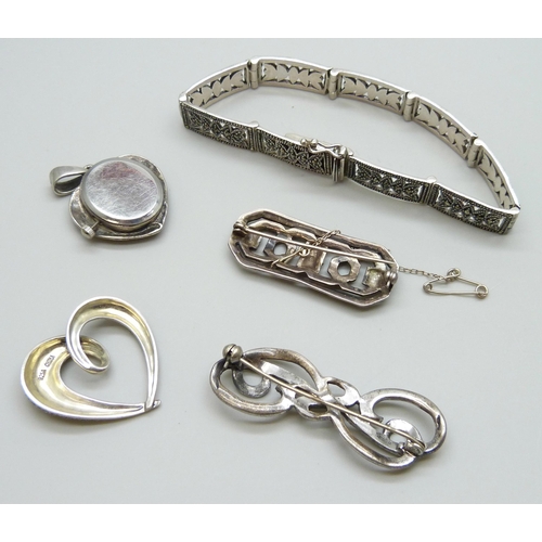 7058 - A collection of silver and marcasite jewellery - a bracelet, two brooches and a pendant, 41g, togeth... 