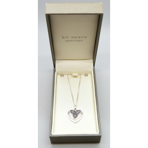 7064 - A Kit Heath silver pendant and chain, boxed