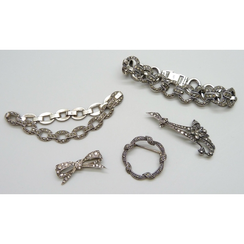 7067 - A collection of silver and marcasite jewellery - two bracelets and two brooches, 44g, and an unmarke... 