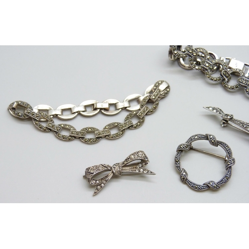 7067 - A collection of silver and marcasite jewellery - two bracelets and two brooches, 44g, and an unmarke... 