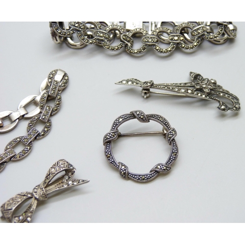 7067 - A collection of silver and marcasite jewellery - two bracelets and two brooches, 44g, and an unmarke... 