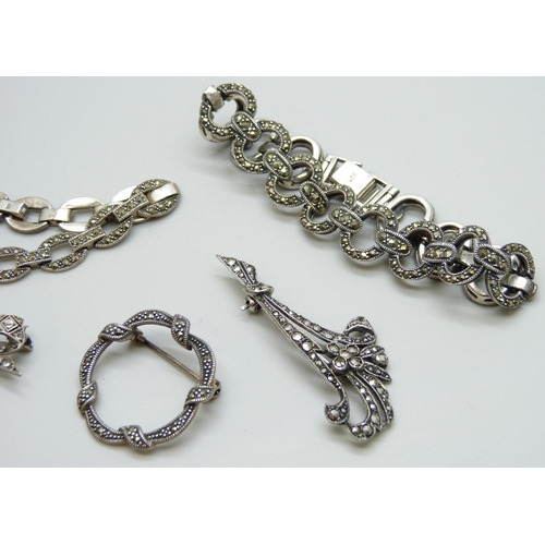 7067 - A collection of silver and marcasite jewellery - two bracelets and two brooches, 44g, and an unmarke... 