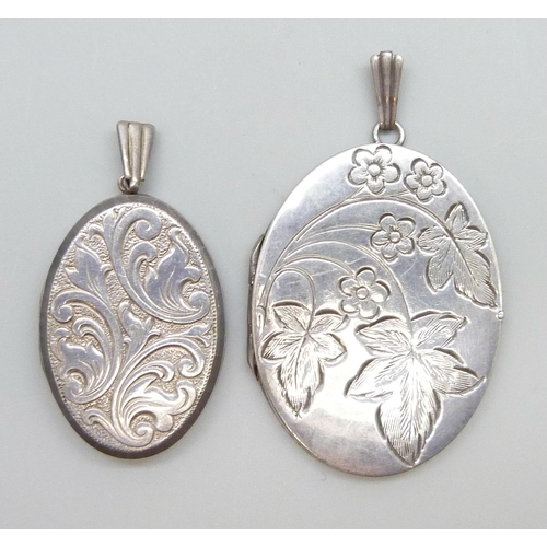 7068 - A Georg Jensen silver locket, 4cm, and a larger silver locket, 19g