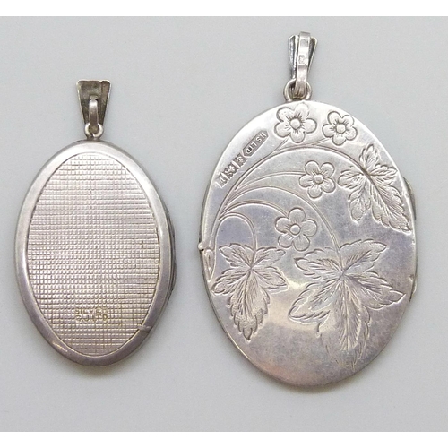 7068 - A Georg Jensen silver locket, 4cm, and a larger silver locket, 19g