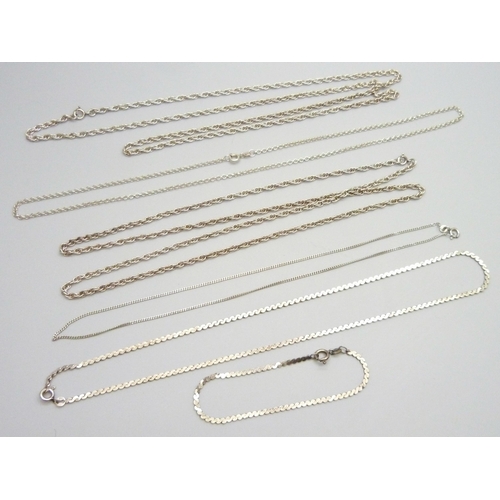 7069 - Five silver chains and a silver bracelet, 48g