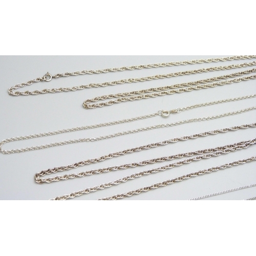 7069 - Five silver chains and a silver bracelet, 48g