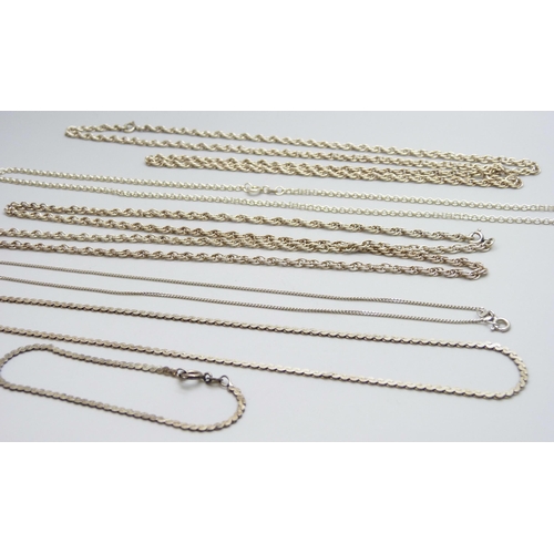 7069 - Five silver chains and a silver bracelet, 48g