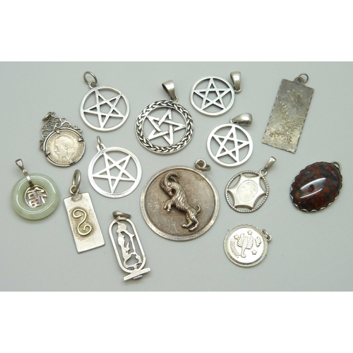 7070 - A collection of 12 silver pendants including a large UnoAerre Zodiac ram pendant, 4.5cm, and a Charl... 