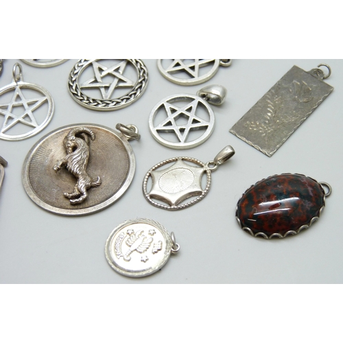 7070 - A collection of 12 silver pendants including a large UnoAerre Zodiac ram pendant, 4.5cm, and a Charl... 