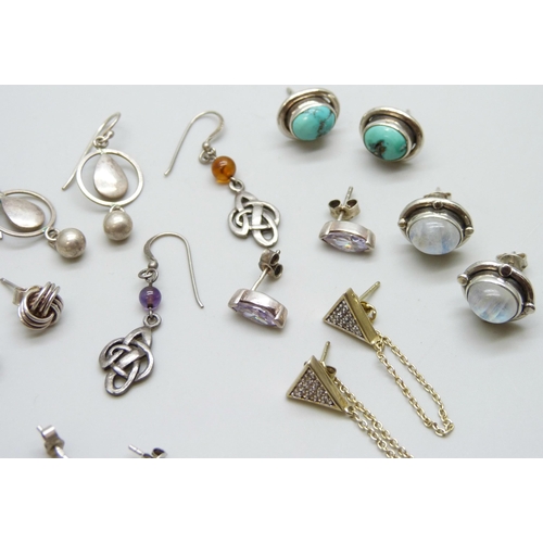 7073 - A collection of silver and white metal earrings including Pandora, 28g, together with a pair of plat... 