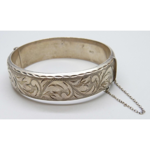 7079 - An Italian silver bracelet and a silver bangle, 50g