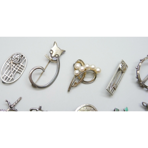 7081 - Eight silver brooches and two white metal brooches including a Vera Halusewa stone set example, 47g