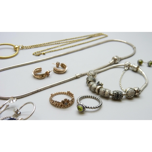 7084 - A collection of silver Pandora jewellery - A necklace, a bracelet with eight Pandora charms, a match... 