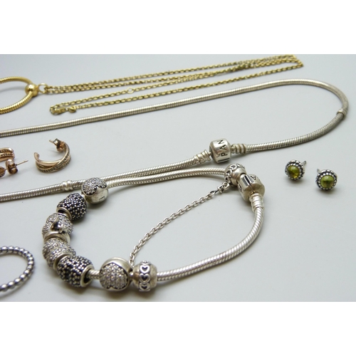 7084 - A collection of silver Pandora jewellery - A necklace, a bracelet with eight Pandora charms, a match... 