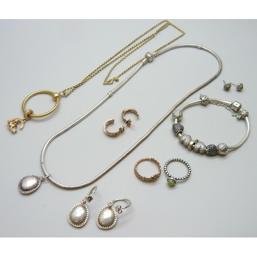 7084 - A collection of silver Pandora jewellery - A necklace, a bracelet with eight Pandora charms, a match... 