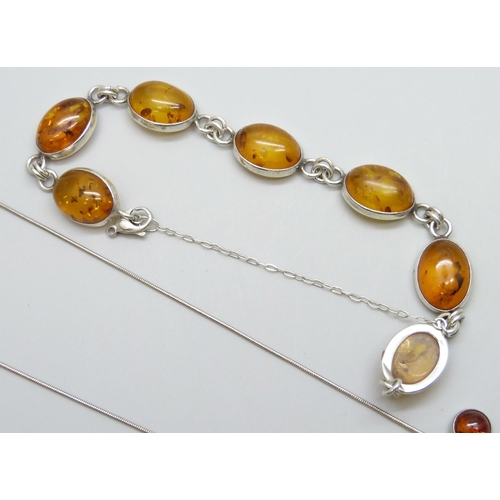 7084C - A silver and amber bracelet and necklace, 23g