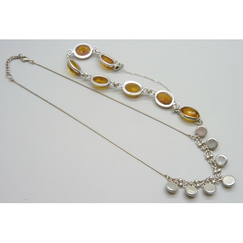 7084C - A silver and amber bracelet and necklace, 23g