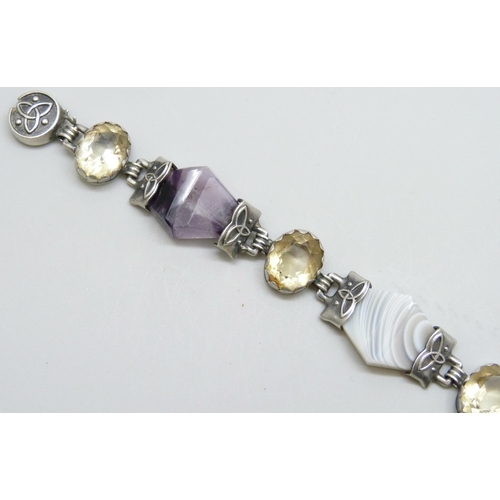 7086 - A white metal Scottish stone set panel bracelet including amethyst and moss agate, safety chain a/f,... 