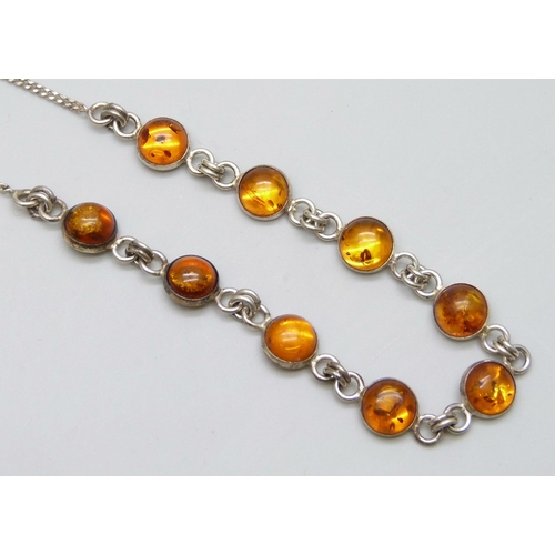 7087 - A silver and amber pendant and a silver and amber necklace, 17g