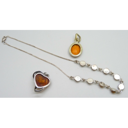 7087 - A silver and amber pendant and a silver and amber necklace, 17g