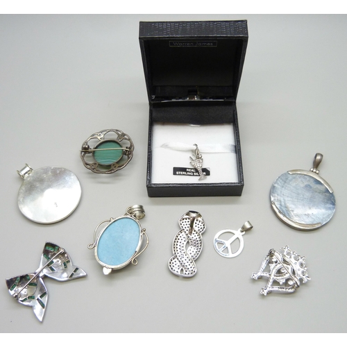 7098 - A collection of silver brooches and pendants, 57g, together with a silver plated pendant