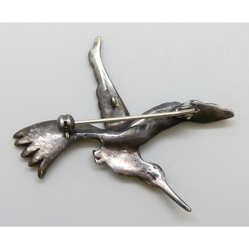 7099 - A silver, enamel and marcasite bird brooch, acid tests as silver, 9g, 5cm