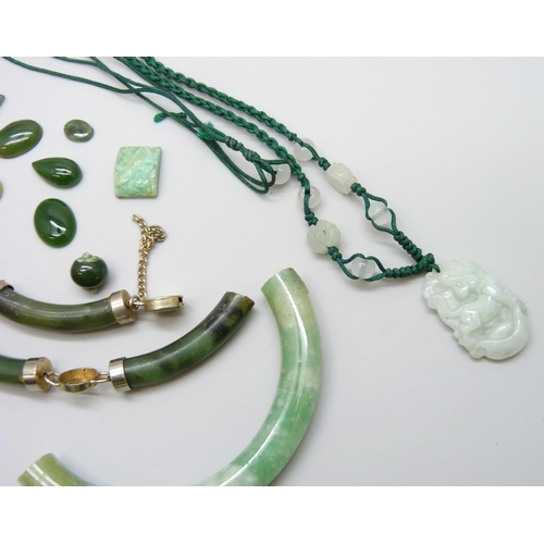 7100 - A collection of jade, unmounted plaques etc.