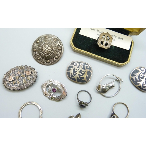 7101 - A collection of silver jewellery - two silver brooches including Victorian, a silver badge, a Mexica... 