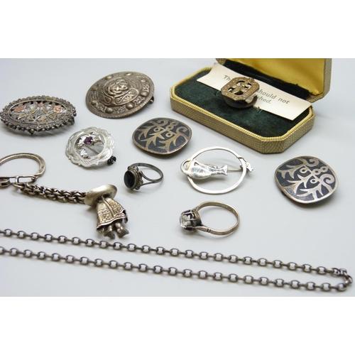 7101 - A collection of silver jewellery - two silver brooches including Victorian, a silver badge, a Mexica... 