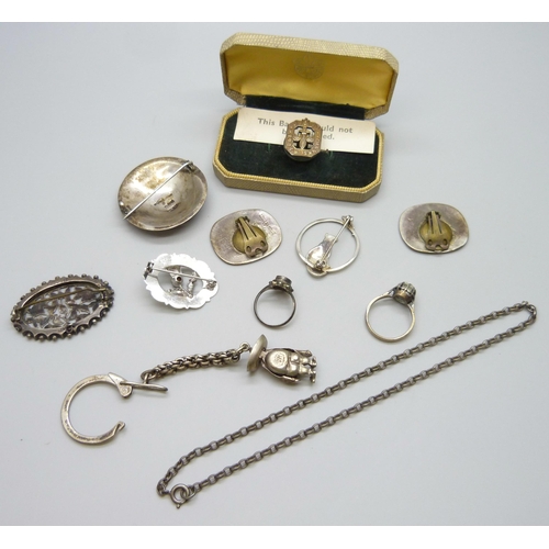 7101 - A collection of silver jewellery - two silver brooches including Victorian, a silver badge, a Mexica... 