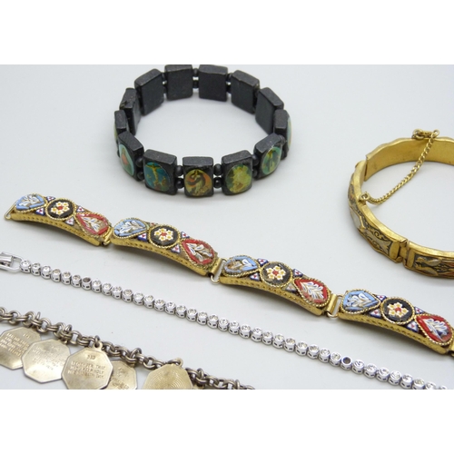 7102 - A Swarovski bracelet, a micro mosaic bracelet, and four others