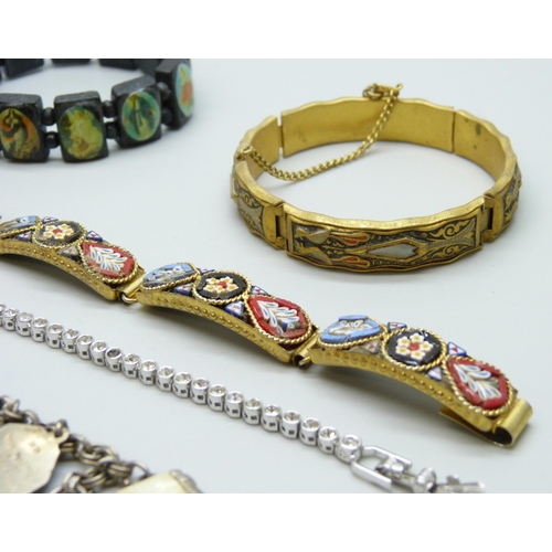 7102 - A Swarovski bracelet, a micro mosaic bracelet, and four others