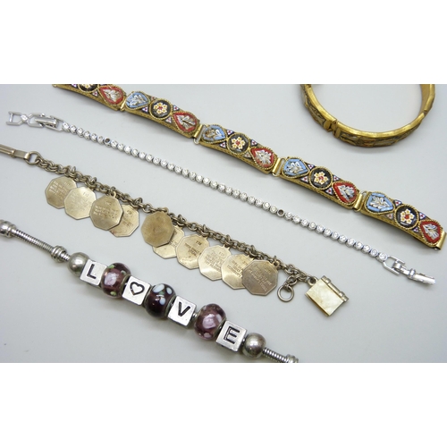 7102 - A Swarovski bracelet, a micro mosaic bracelet, and four others