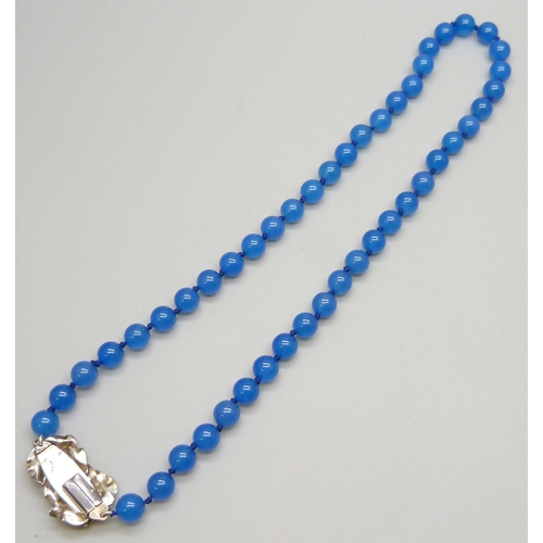 7103 - A blue bead necklace with a .800 silver fastener signed 'Giovanna', 39g