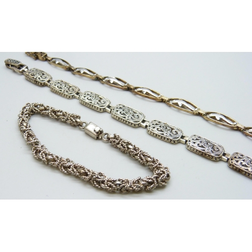 7106 - Three silver bracelets including a Mexican silver Byzantine link example