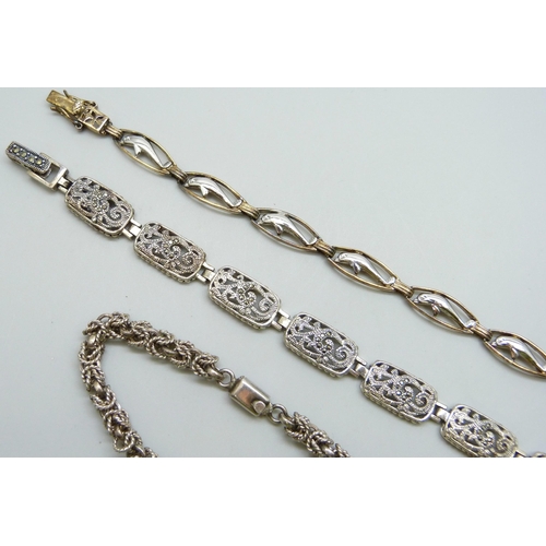 7106 - Three silver bracelets including a Mexican silver Byzantine link example