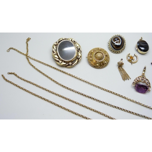 7126 - A collection of Victorian and later jewellery including brooches, pendants, a locket, a long guard c... 