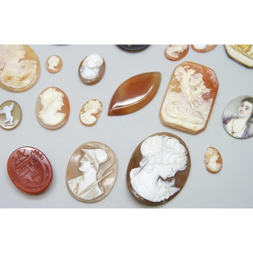 7131 - A collection of unmounted cameos and plaques including a Wedgwood plaque, 3.5cm, a pietra dura examp... 