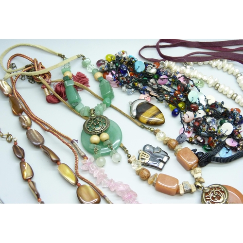 7134 - A collection of costume jewellery including semi precious stones