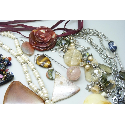 7134 - A collection of costume jewellery including semi precious stones