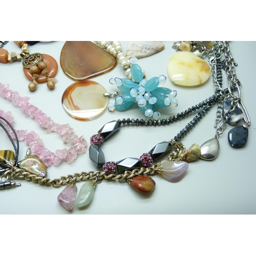 7134 - A collection of costume jewellery including semi precious stones