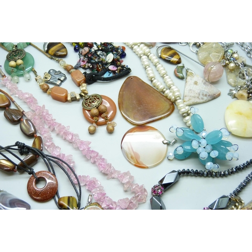 7134 - A collection of costume jewellery including semi precious stones