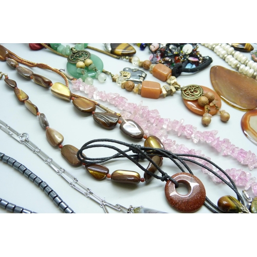 7134 - A collection of costume jewellery including semi precious stones