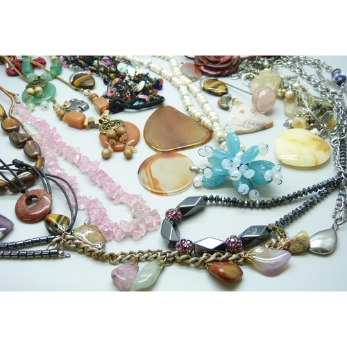 7134 - A collection of costume jewellery including semi precious stones